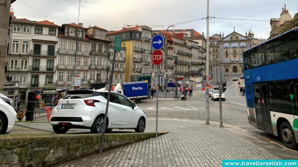A car driving through central Porto.