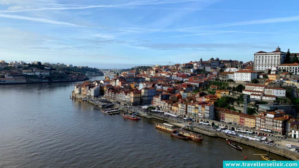 A photo of the riverfront in Porto taken from the Dom Luís I Bridge.