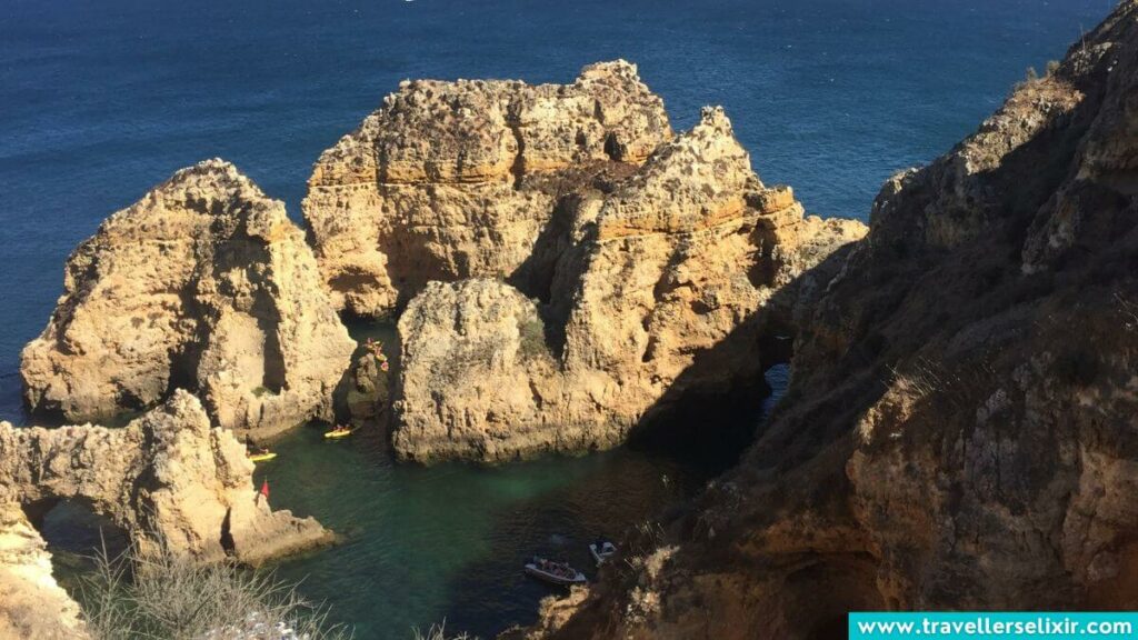 Boats exploring the caves at Ponta da Piedade.