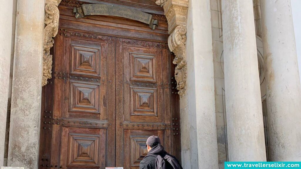 Fancy wooden door at the University of Coimbra.