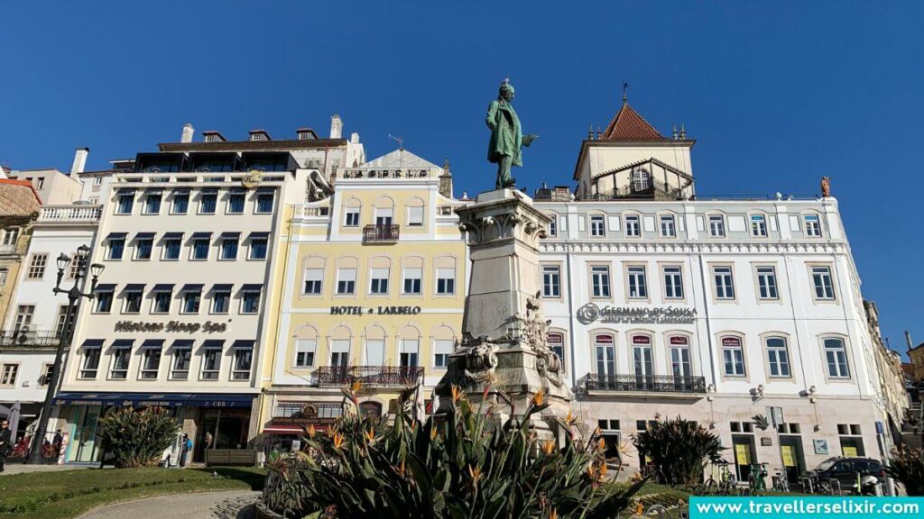 Statue in the Largo da Portagem main square in Coimbra.