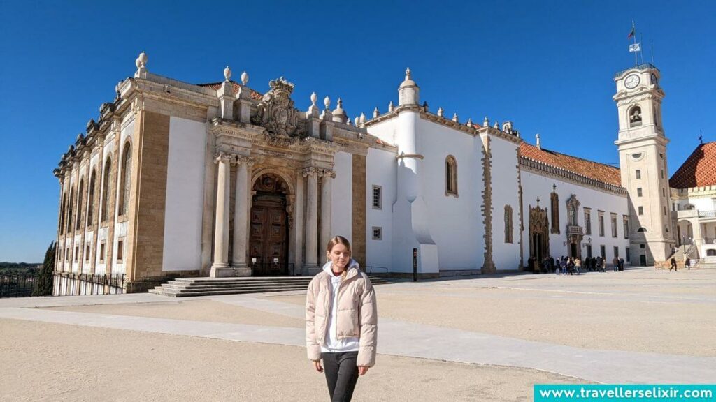 Photo of me in front of the Joanina Library at the University of Coimbra.