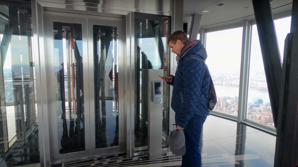 Glass elevator on the 102nd floor of the Empire State Building.