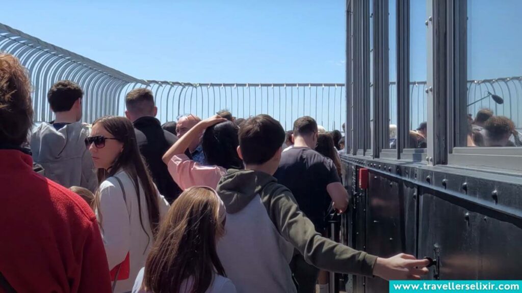 Crowds on the 86th floor observation deck at the Empire State Building.