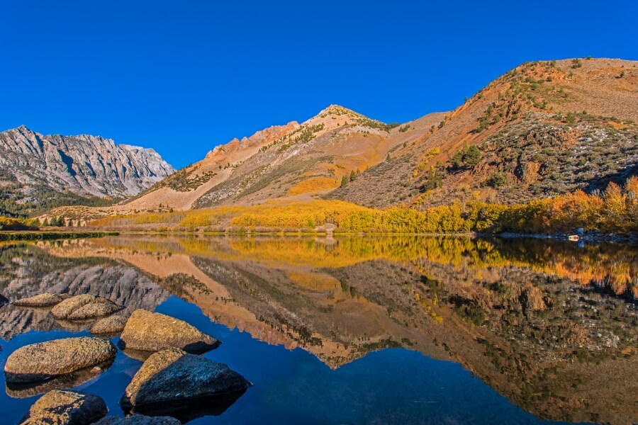North Lake in the fall at dawn with aspens and reflections, headwater for North Fork of the Bishop Creek. Inyo National Forest near Bishop, California. (1)